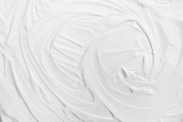 Close-up of creamy cleanser texture emphasizing its consistency and effectiveness in skincare routines.